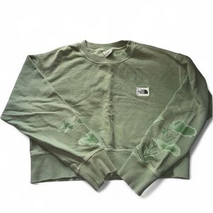 The North Face green flower sleeve crewneck